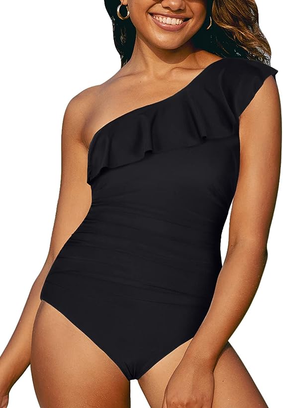 Woman wearing a black one piece bathing suit