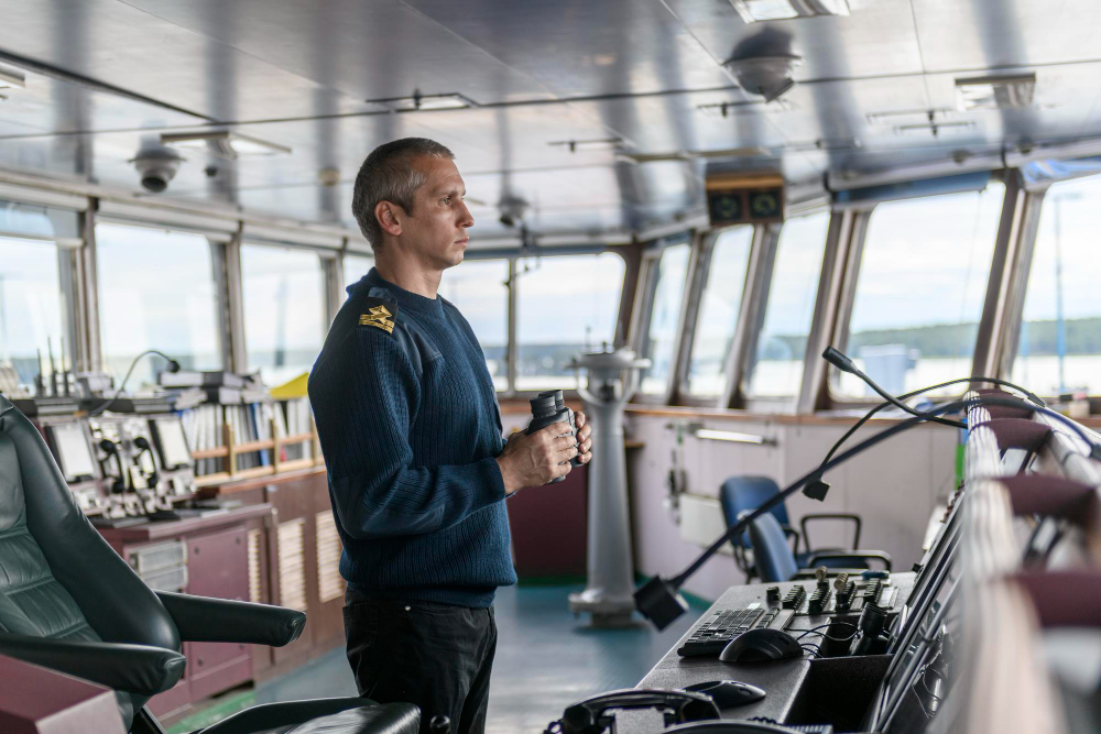 Ship captain holding his binoculars