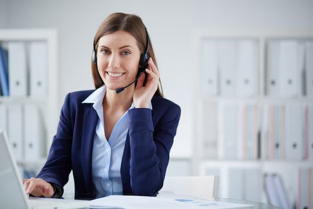 Travel agent in a headset smiling