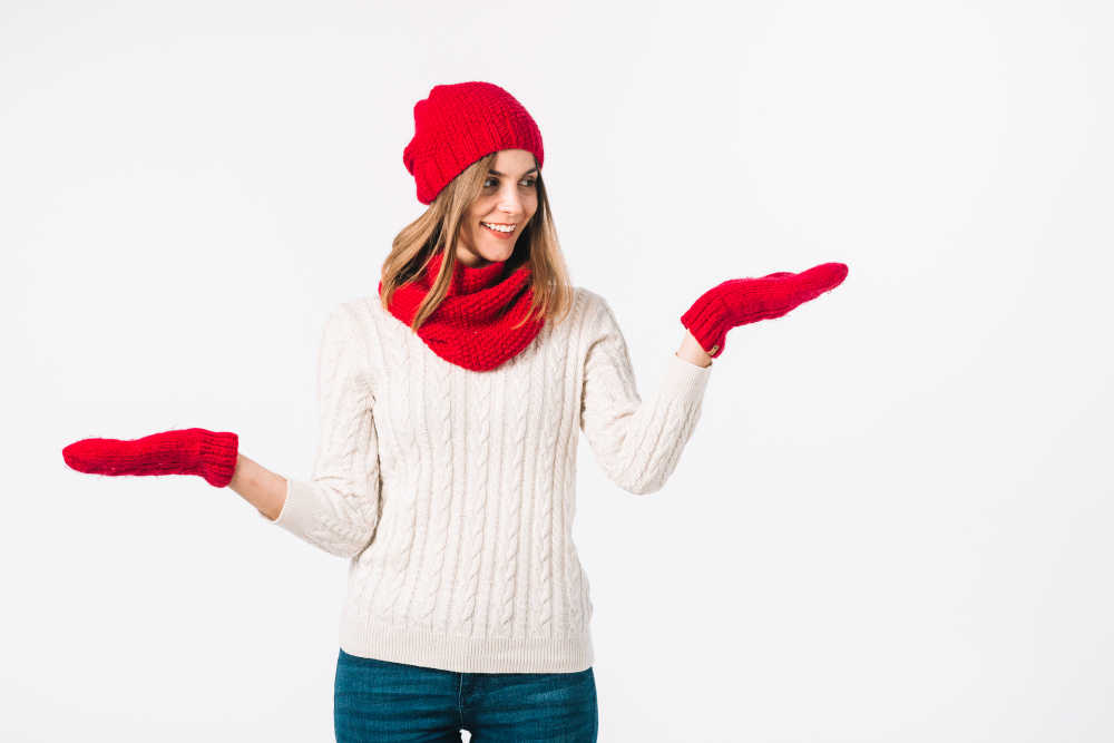 Woman wearing red gloves and hats