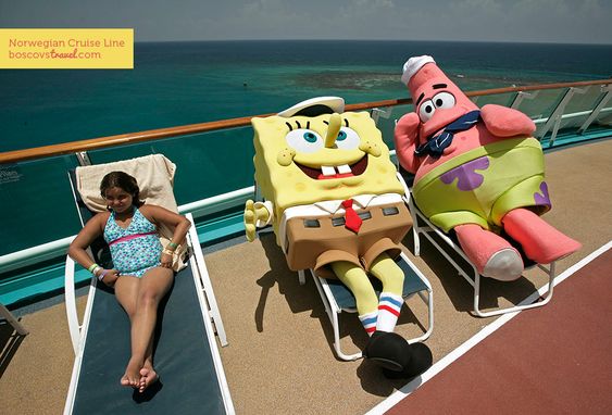 A kid and two mascots sunbathing