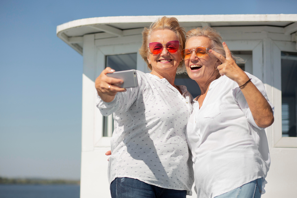 Women Senior Citizens in Sunglasses taking a selfie