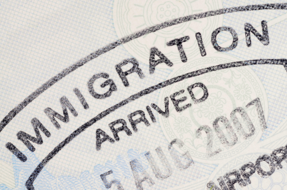 Close up Immigration stamp on passport