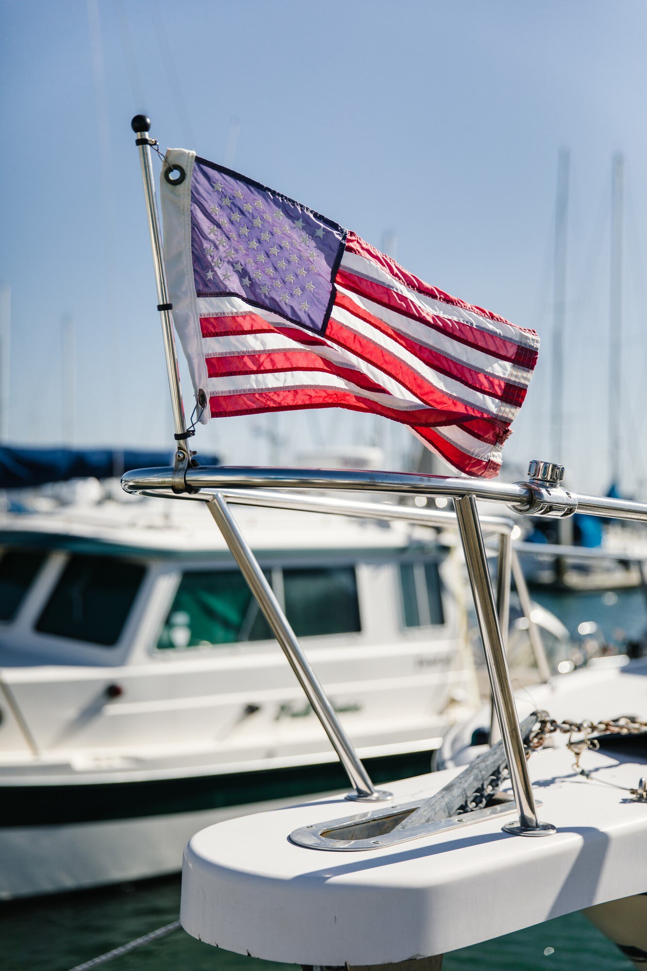 US flag placed in front of a boat