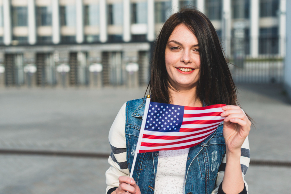 Woman holding a US flag